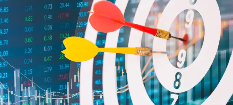 Two darts hitting a target, overlaying a background of stock market data.